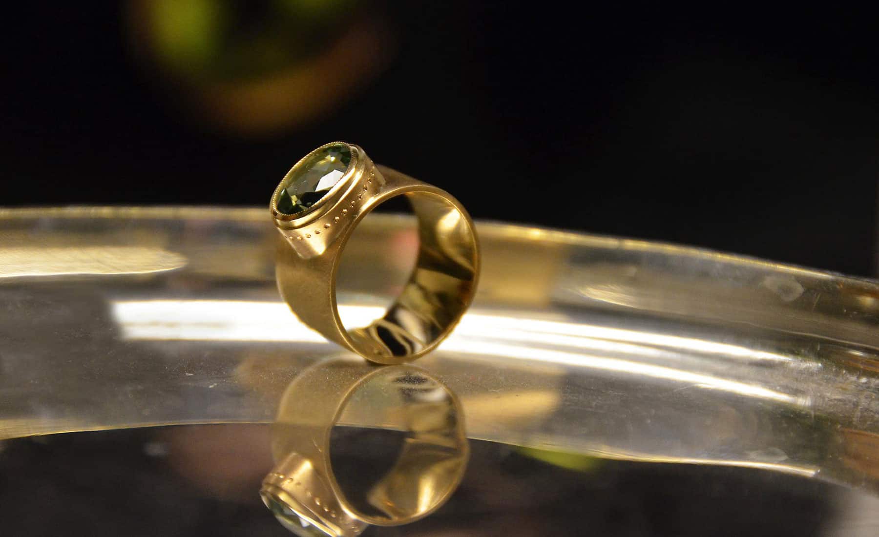 Kulta Ring in Gelbold 750 mit grünem facettiertem Turmalin 3.6ct